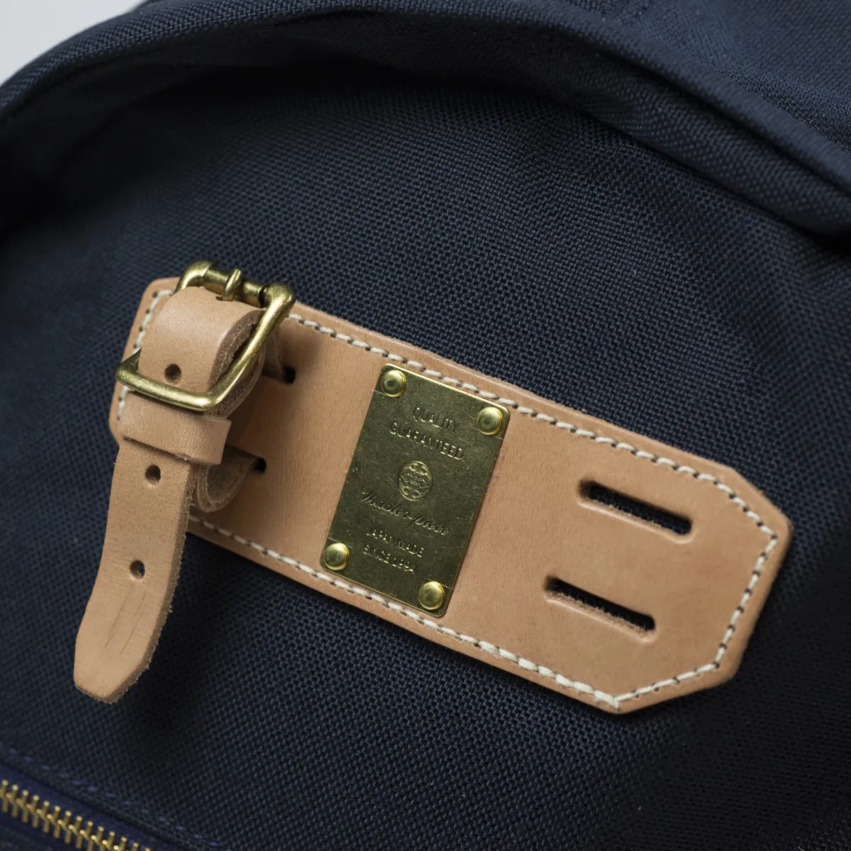 "Surpass" backpack, navy Cordura and natural leather
