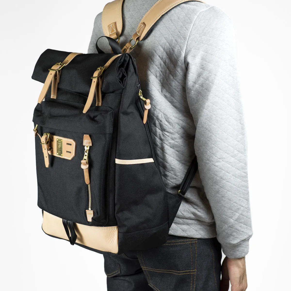"Surpass" roll-top backpack, black Cordura and natural leather