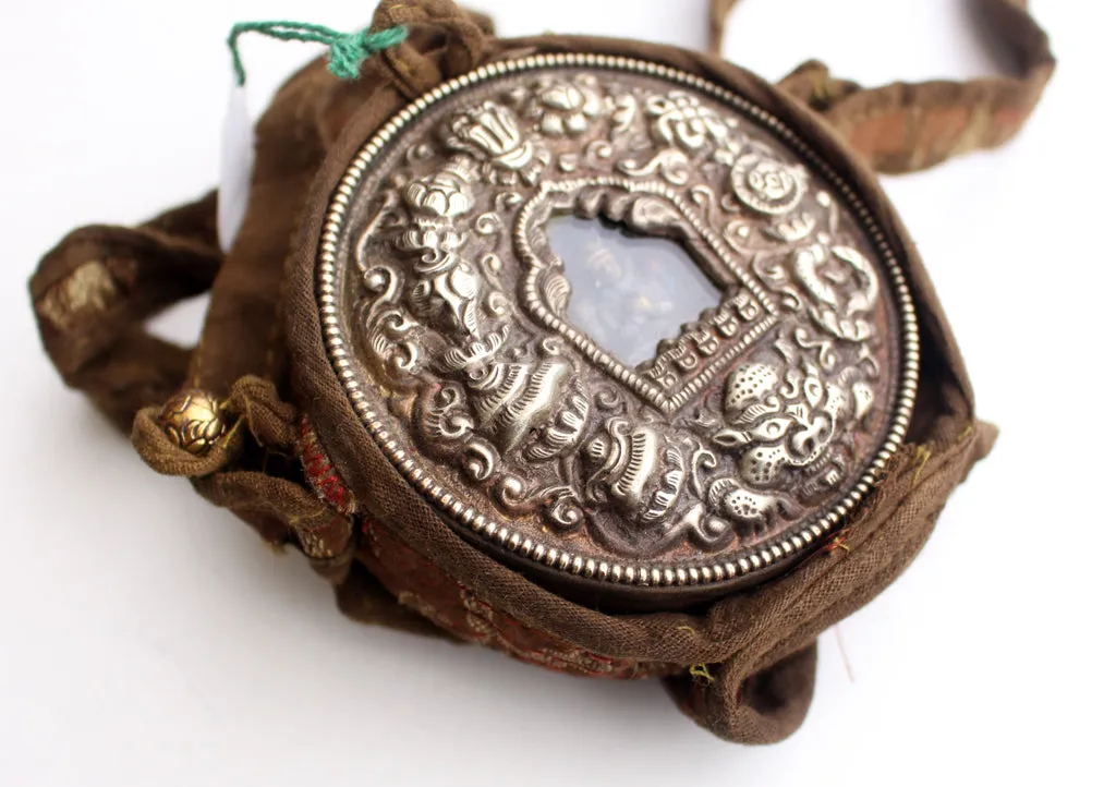White Metal Auspicious Symbol Carved Chenrezig Ghau Pendant with Cotton Cover